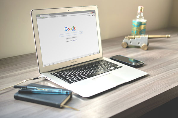Picture of open laptop on a desk